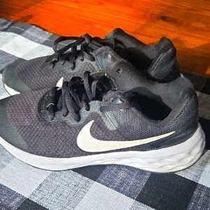 Nike Black and White Sneakers with Streamlined Design